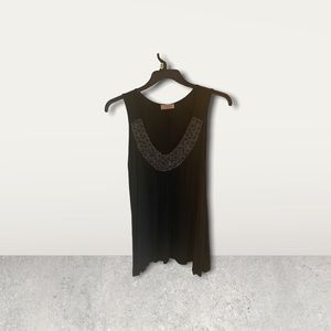 Flowing black blouse jeweled neckline